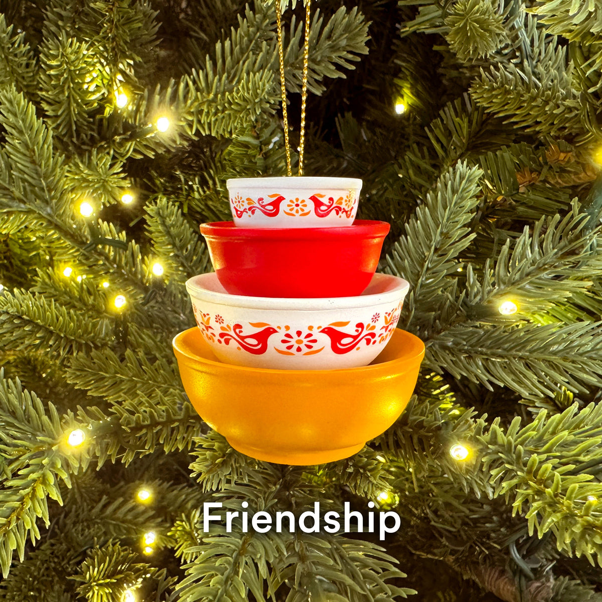 Mini Pyrex-inspired bowl ornament, stacked red bowls with white floral pattern and hanging cord