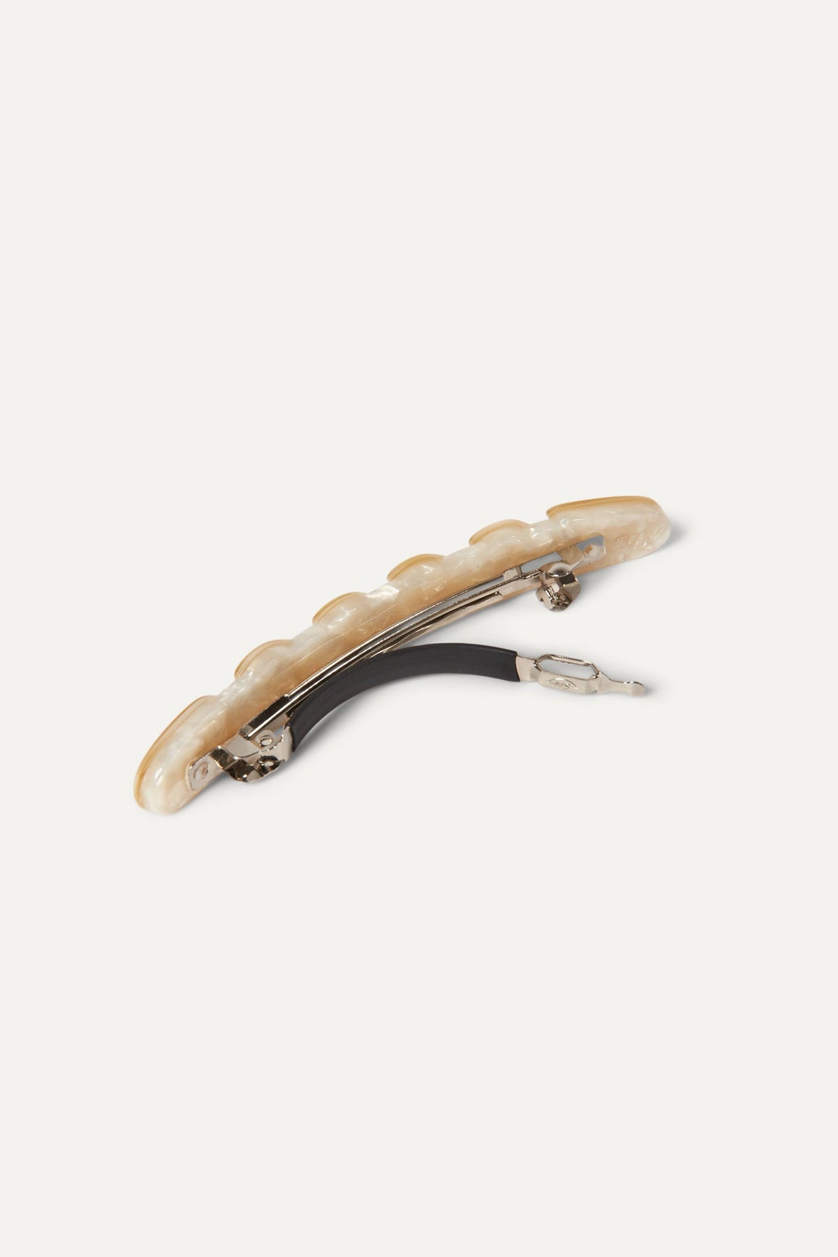 Cream baguette hair barrette with metal spring clip and prongs, side view