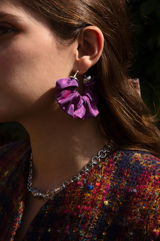 Amethyst scrunchie earrings with ruffled purple fabric and silver-toned hooks