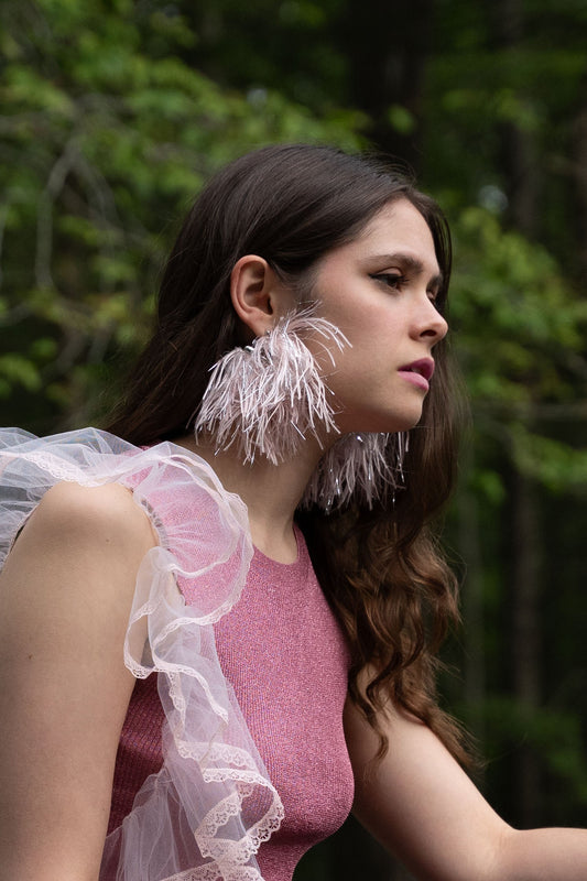 Pink feather fringe earrings with metal loop details