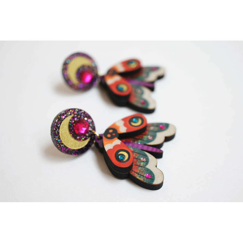 Colorful moth drop earrings with glitter purple spiral tops and layered wing shapes
