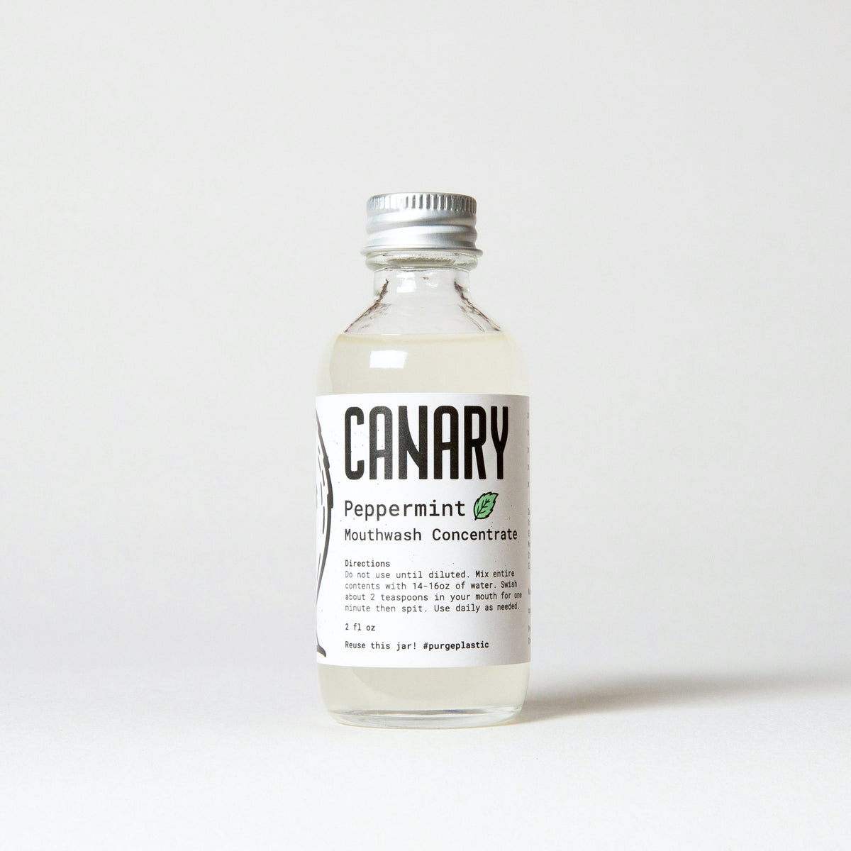 Single bottle of Canary peppermint mouthwash concentrate