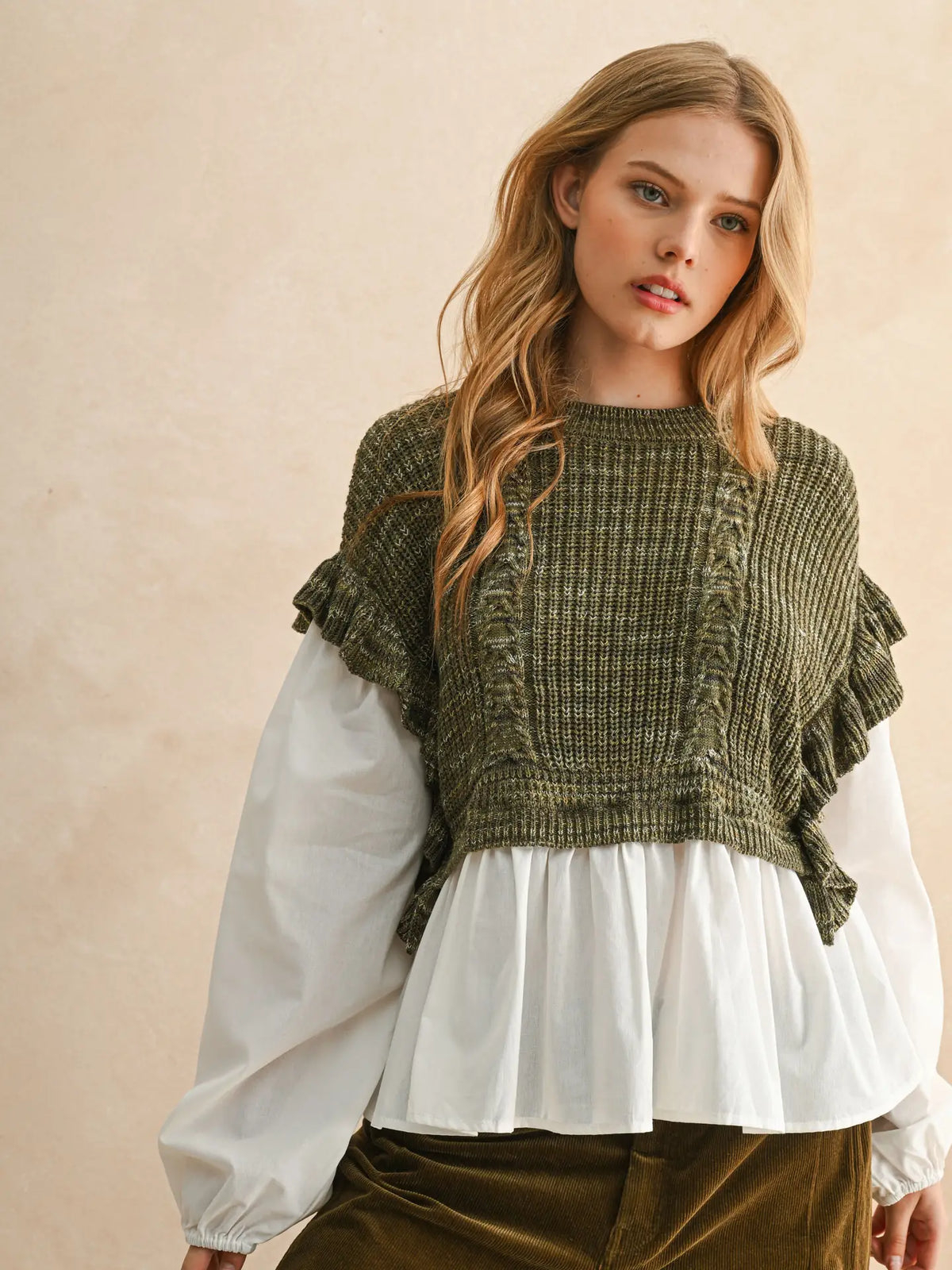 Sprig Top with olive knit bodice, ruffled sleeves, and white gathered blouse hem