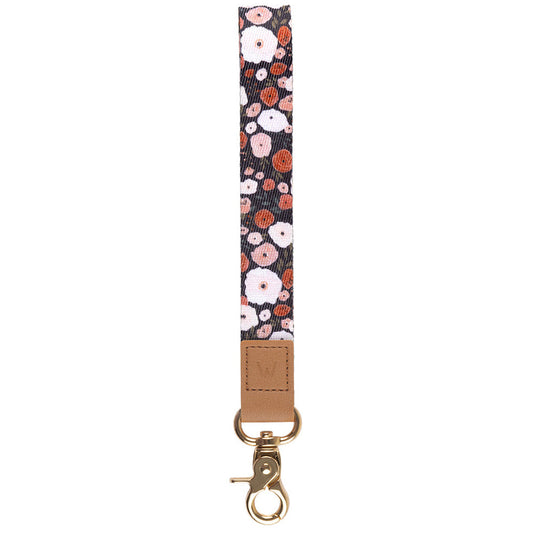 Owl-pattern wrist lanyard with tan leather patch and gold-tone lobster clasp