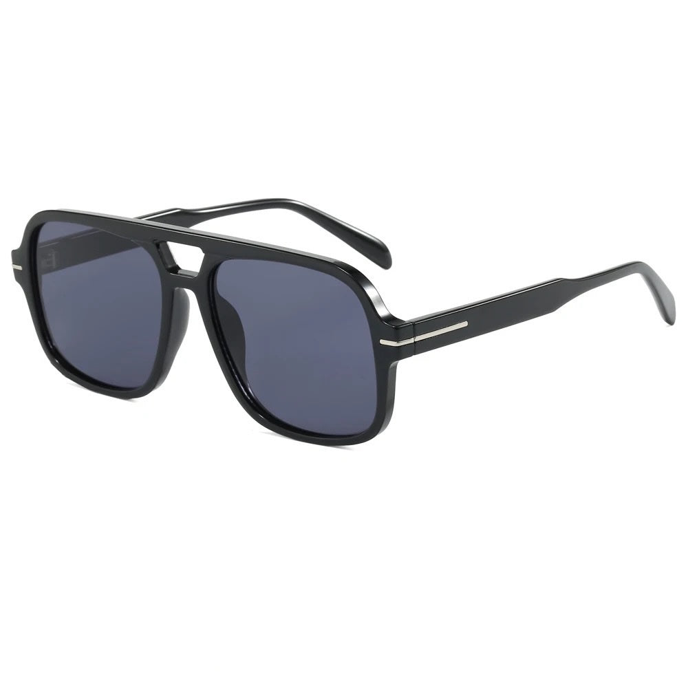 Oversized aviator sunglasses with black frame and dark gray lenses