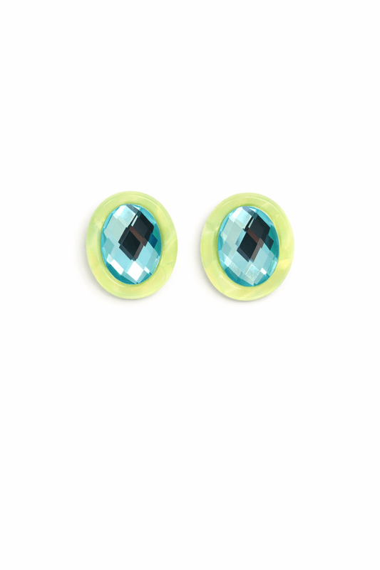 Pair of oval statement earrings with faceted blue stones and pale yellow-green bezels
