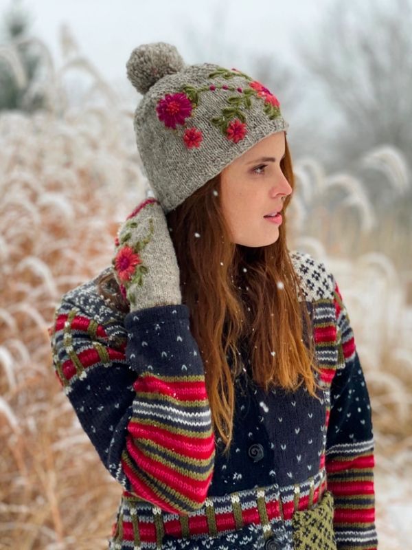 Grey wool knit hat with top pompom and floral embroidery