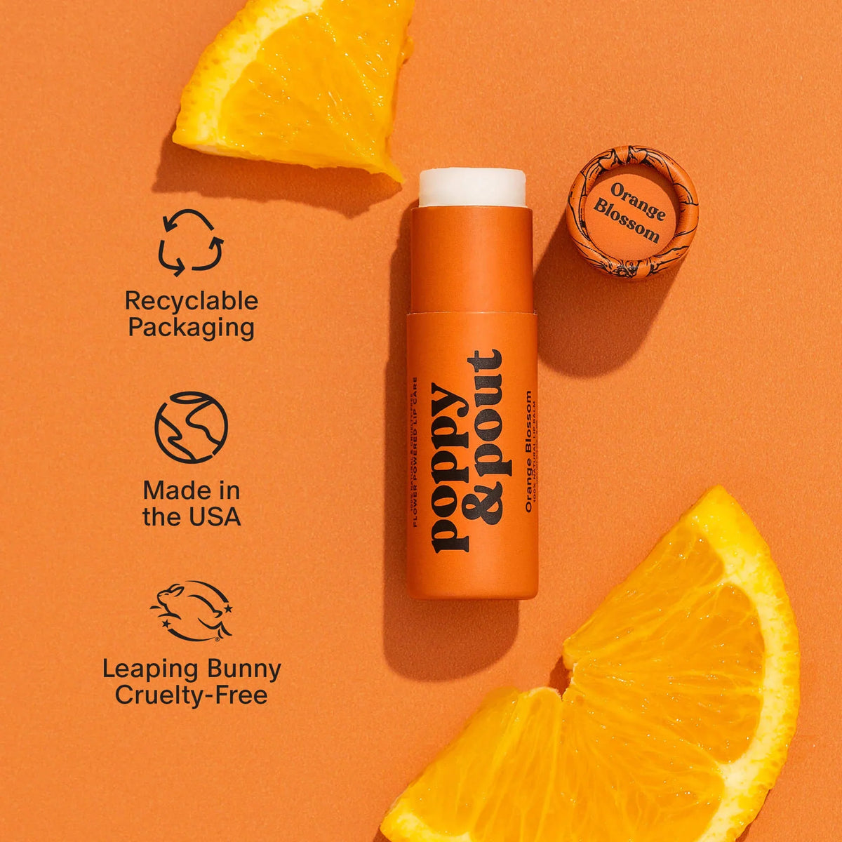Orange blossom lip balm tube with orange slices and small round cap