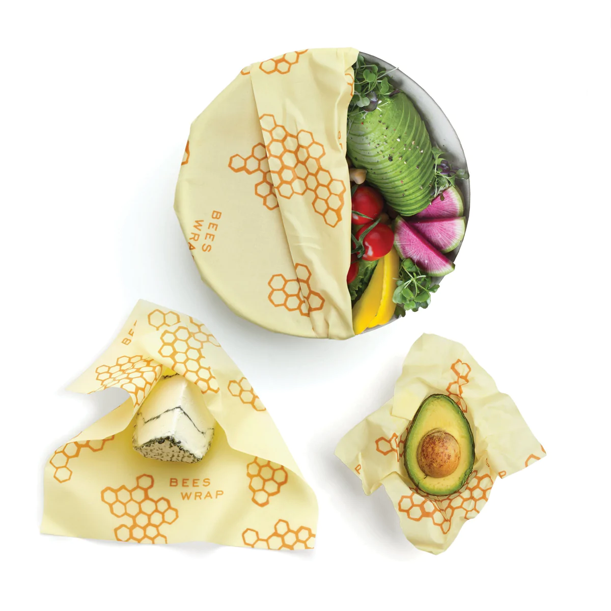 Reusable honeycomb food wraps in light yellow, with orange hexagon designs