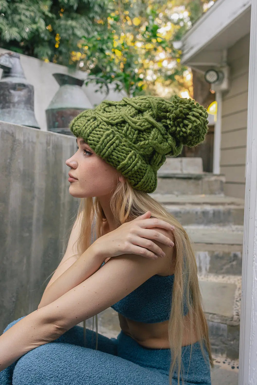Chunky knit pom beanie, olive green with ribbed texture and oversized pom