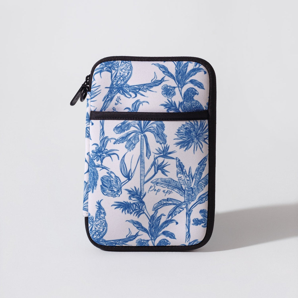 Blue tropical passport wallet with top zipper and hanging loop, rear view