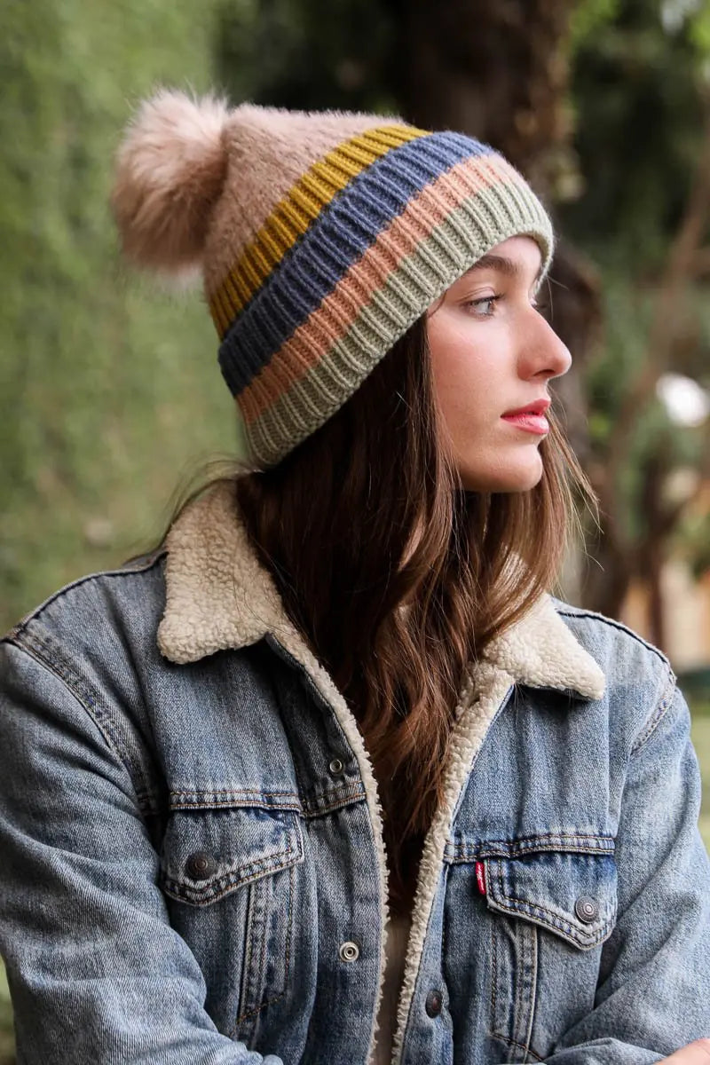 Pastel striped knit beanie with pom-pom; ribbed knit and multicolor bands