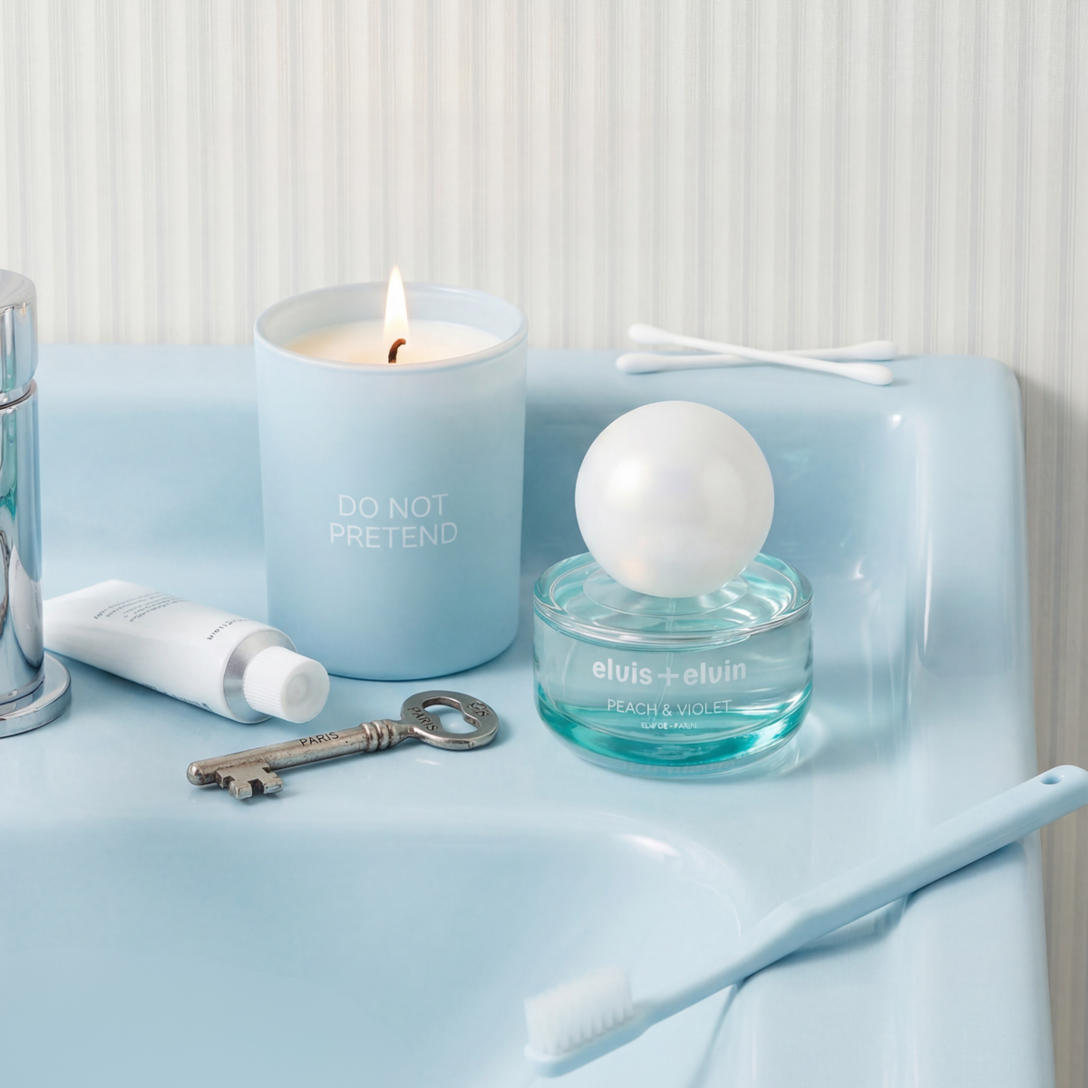 Peach & Violet eau de parfum set on tray with candle and small glass bottle