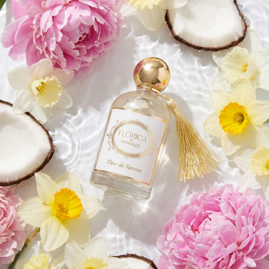 Gold-capped Eau de Parfum bottle with gold tassel, Florica