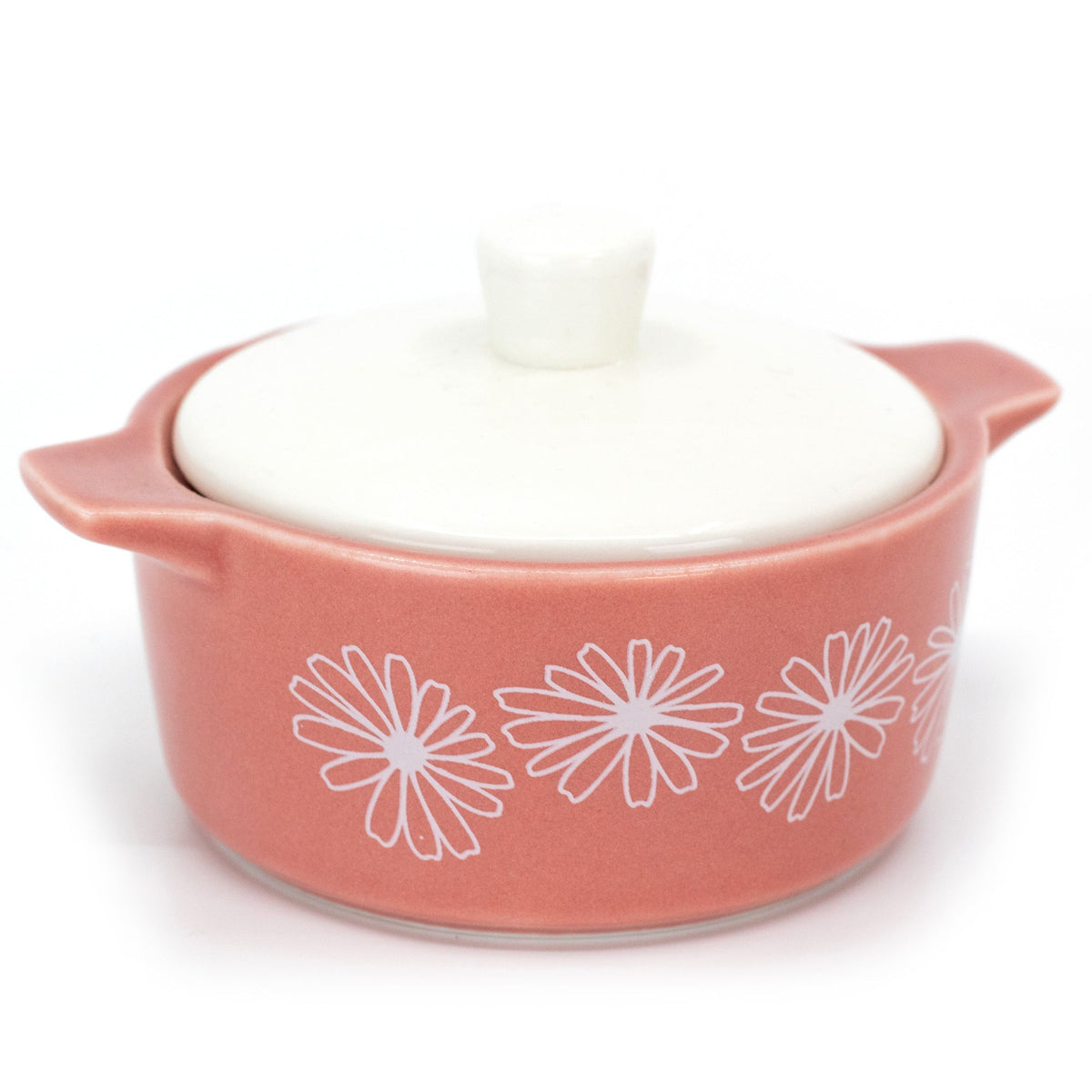 Pink ceramic casserole trinket box with white daisy pattern and closed lid