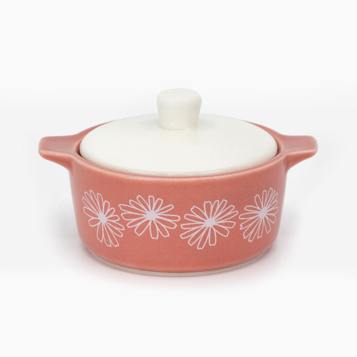 Pink ceramic casserole trinket box with white daisy pattern and domed lid