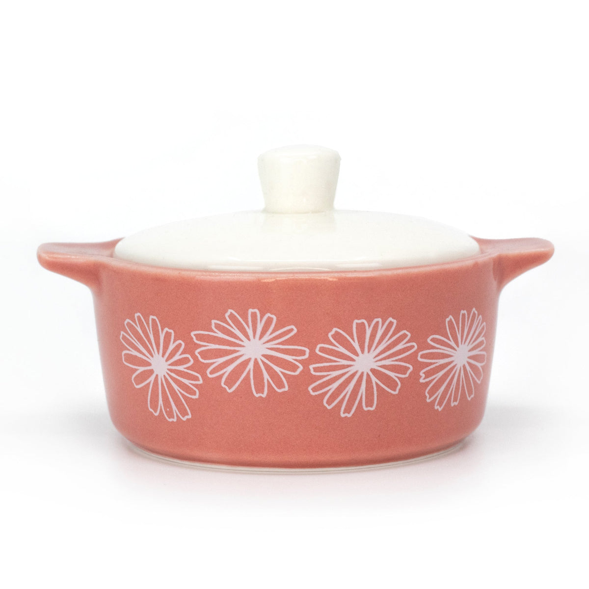 Pink ceramic casserole trinket box with white daisy pattern and domed lid