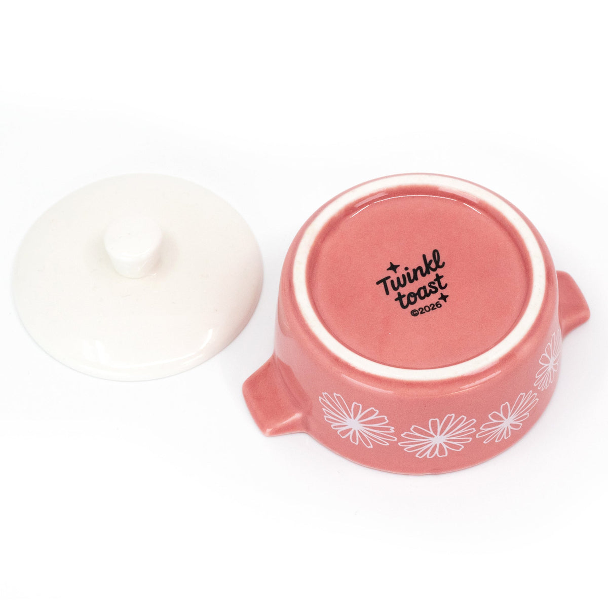 Pink ceramic casserole trinket box with open lid and Twinkle toast stamped on top