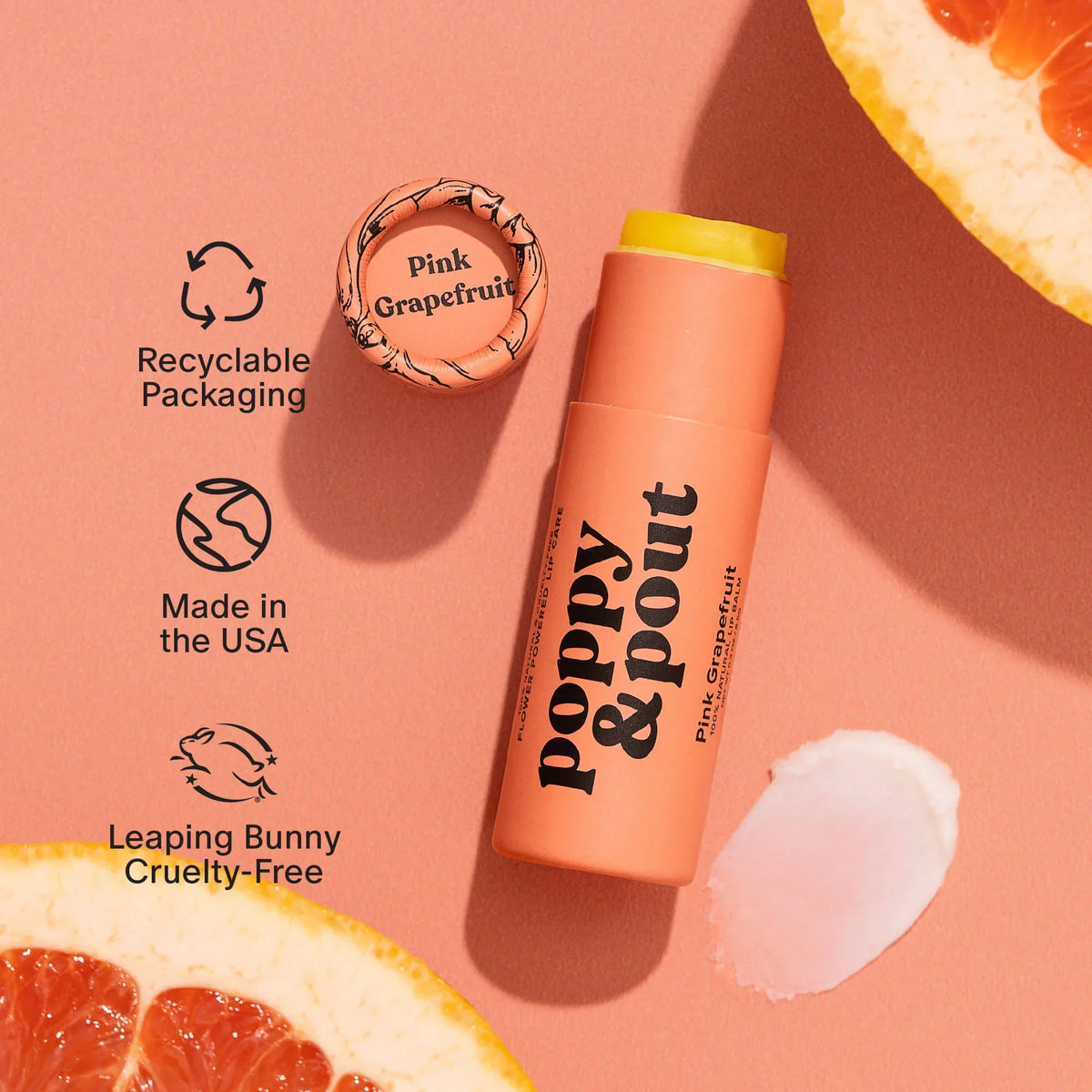Pink grapefruit lip balm tube with yellow cap and white balm swatch