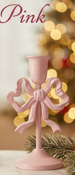 Pink cast iron bow taper candle holder with fluted candle cup