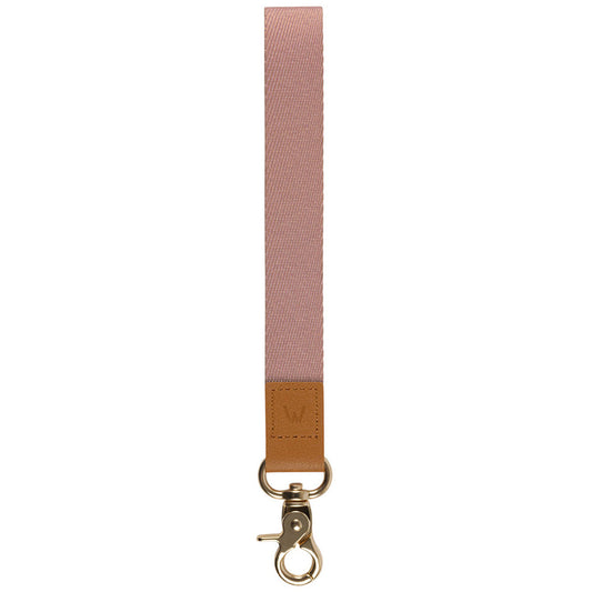 Pink fabric wrist lanyard with tan leather patch and gold metal key ring clasp