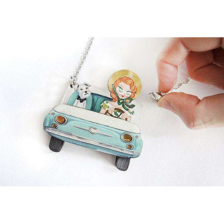 Convertible car brooch and necklace with chain, light blue car pendant close-up