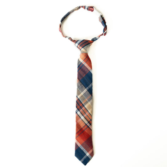 Boys necktie with multicolor plaid pattern in red, blue, orange, and tan.