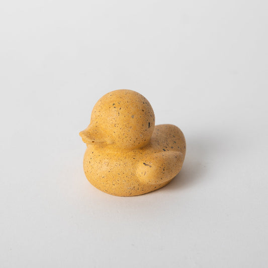 Marigold mini rubber duck figurine, speckled yellow body with side profile