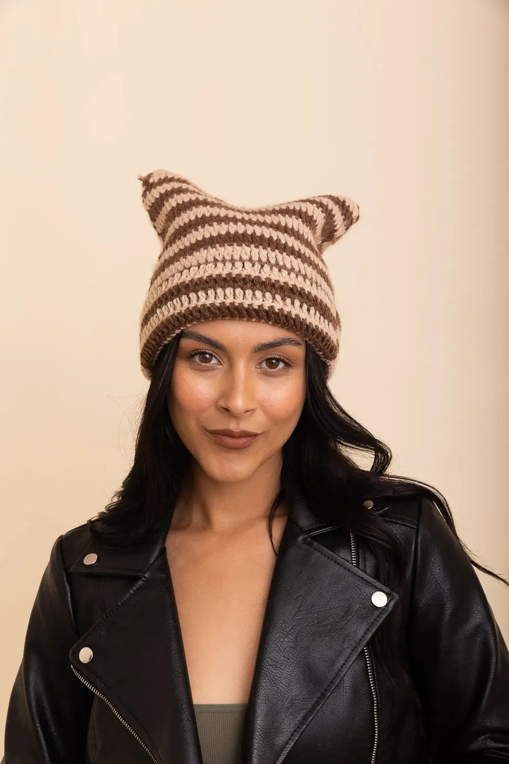 Beige and dark brown striped cat-ear crochet beanie with ribbed knit cuff