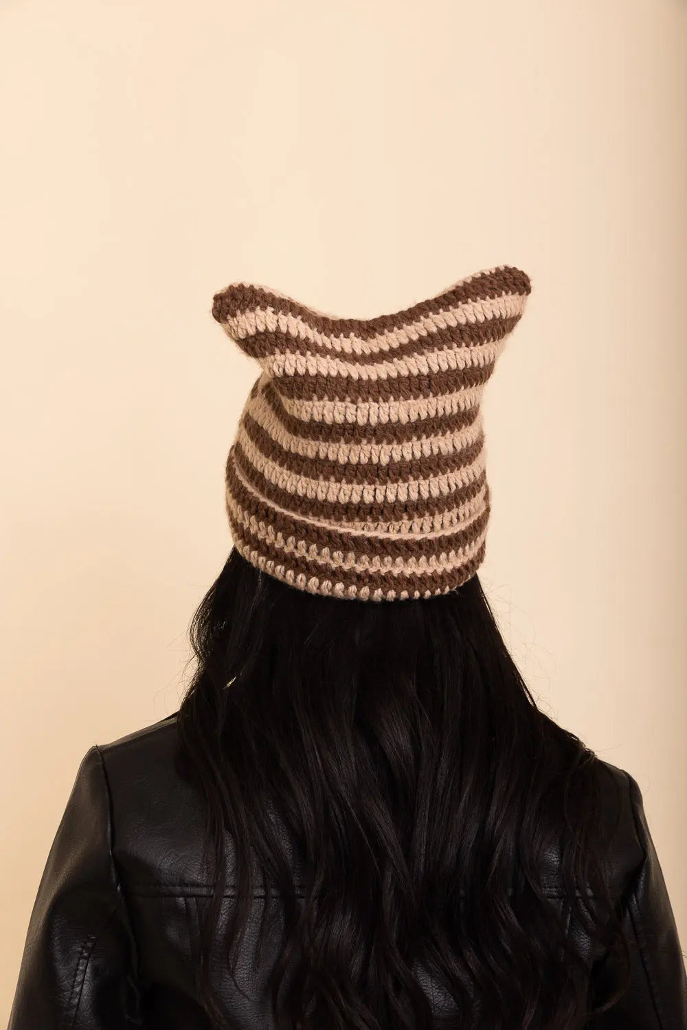 Beige and dark brown striped cat-ear crochet beanie with cat ears, front view
