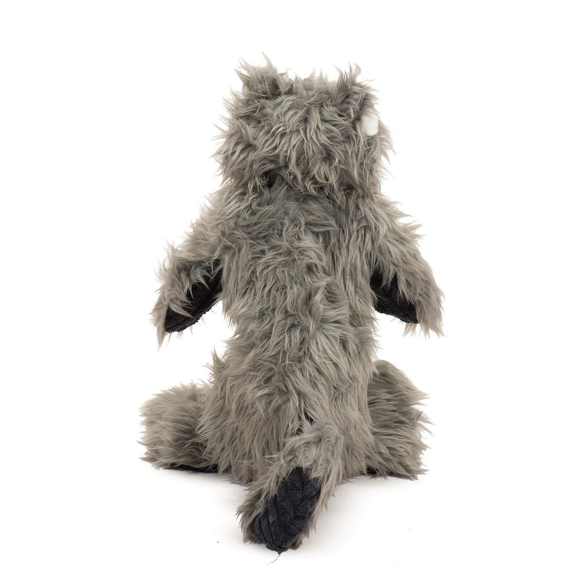 Back view of gray raccoon plush dog toy with a furry tail