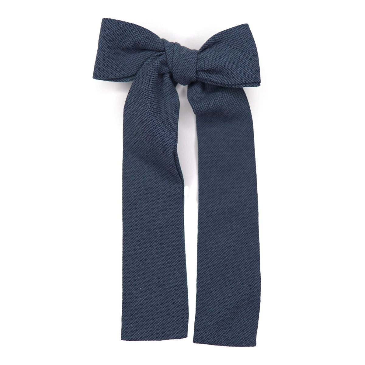 Navy textured lady hair bow with tied center knot and long tails