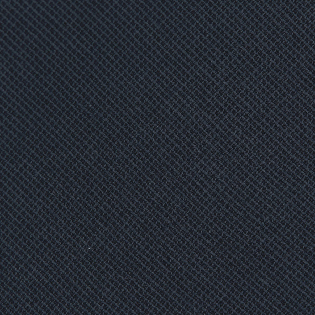 Close-up of navy textured fabric for lady hair bow