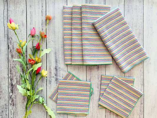 Rainbow striped seersucker cloth napkins set of four, folded and stacked