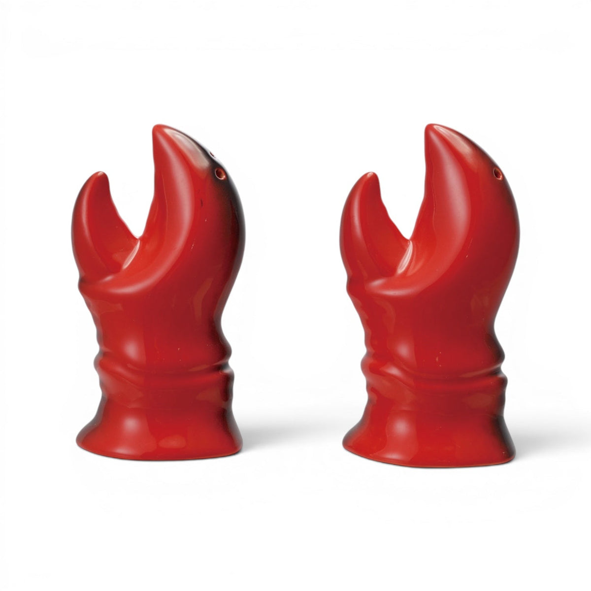 Red lobster claw salt and pepper shaker set, two matching claw figures