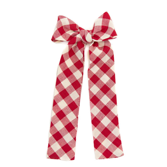 Red and white buffalo check lady hair bow with tied center knot and long tails