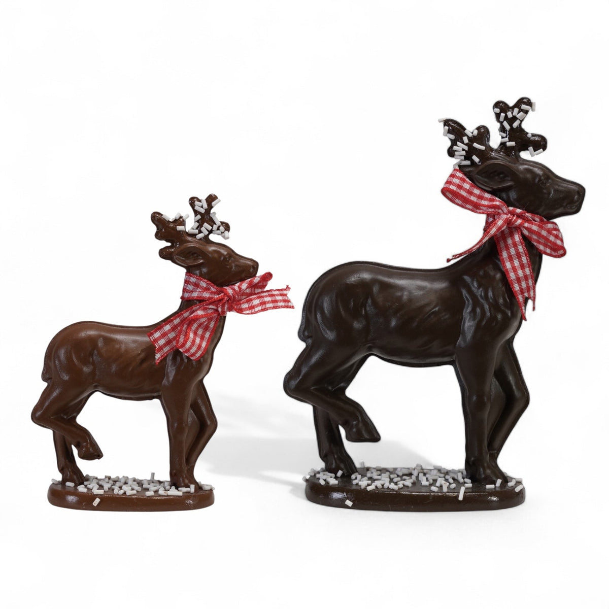 Dark brown resin deer figurine with red gingham bow and sprinkles base