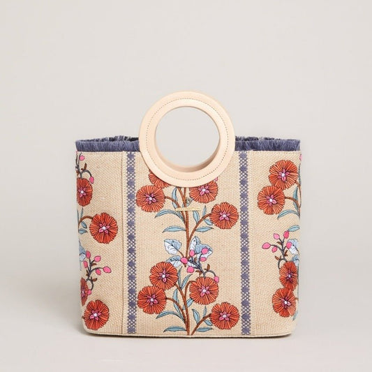 Oyster cream canvas tote with round top handle and orange floral sprig print