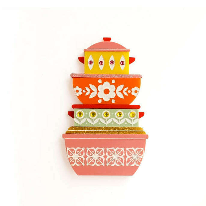 Colorful retro container brooch with layered orange, white, and green pattern