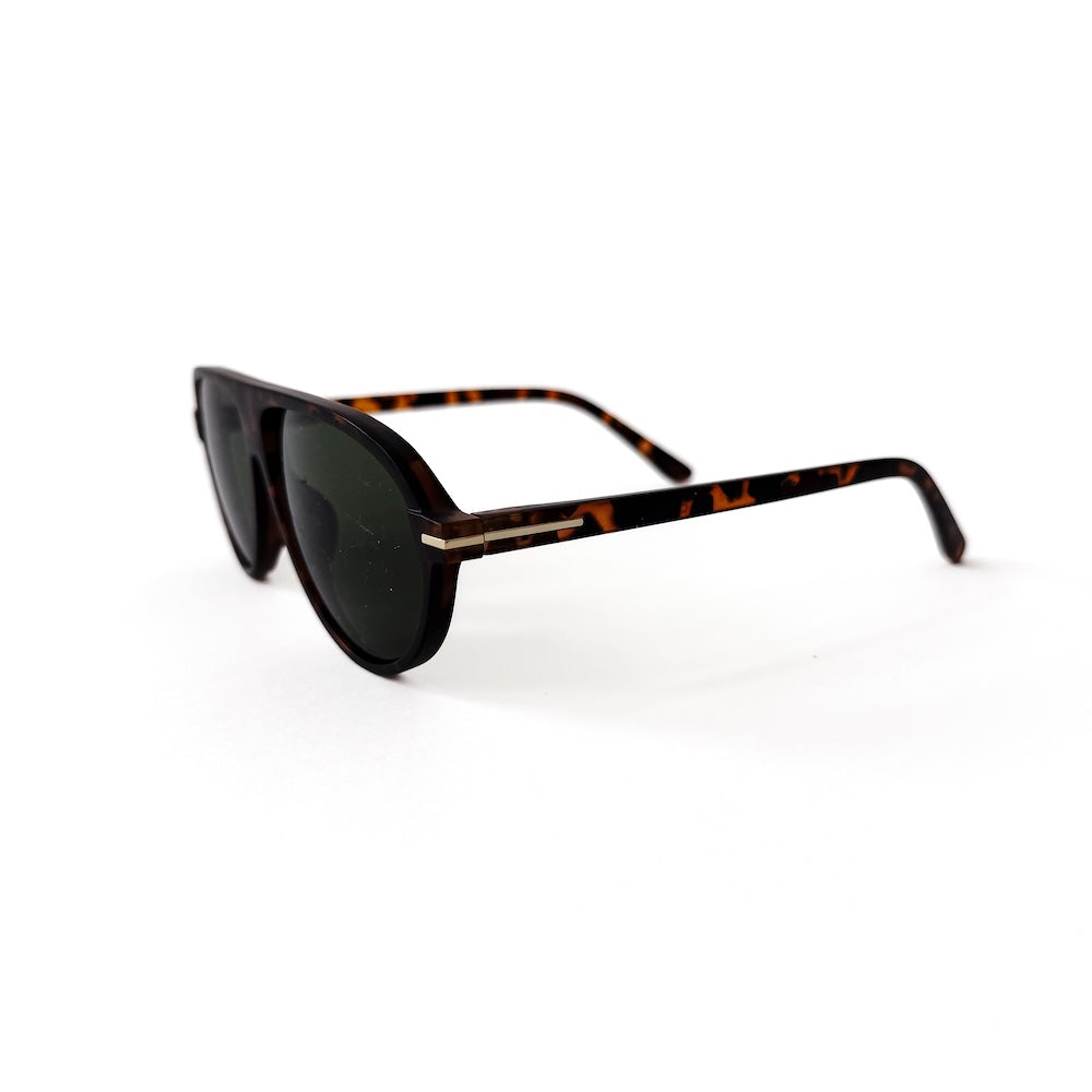 Side view of flat oval sunglasses with tortoise frame and dark lenses