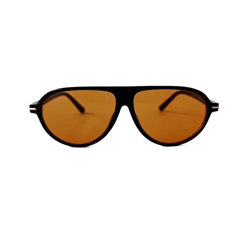 Retro oval flat sunglasses with tortoise frame and amber lenses