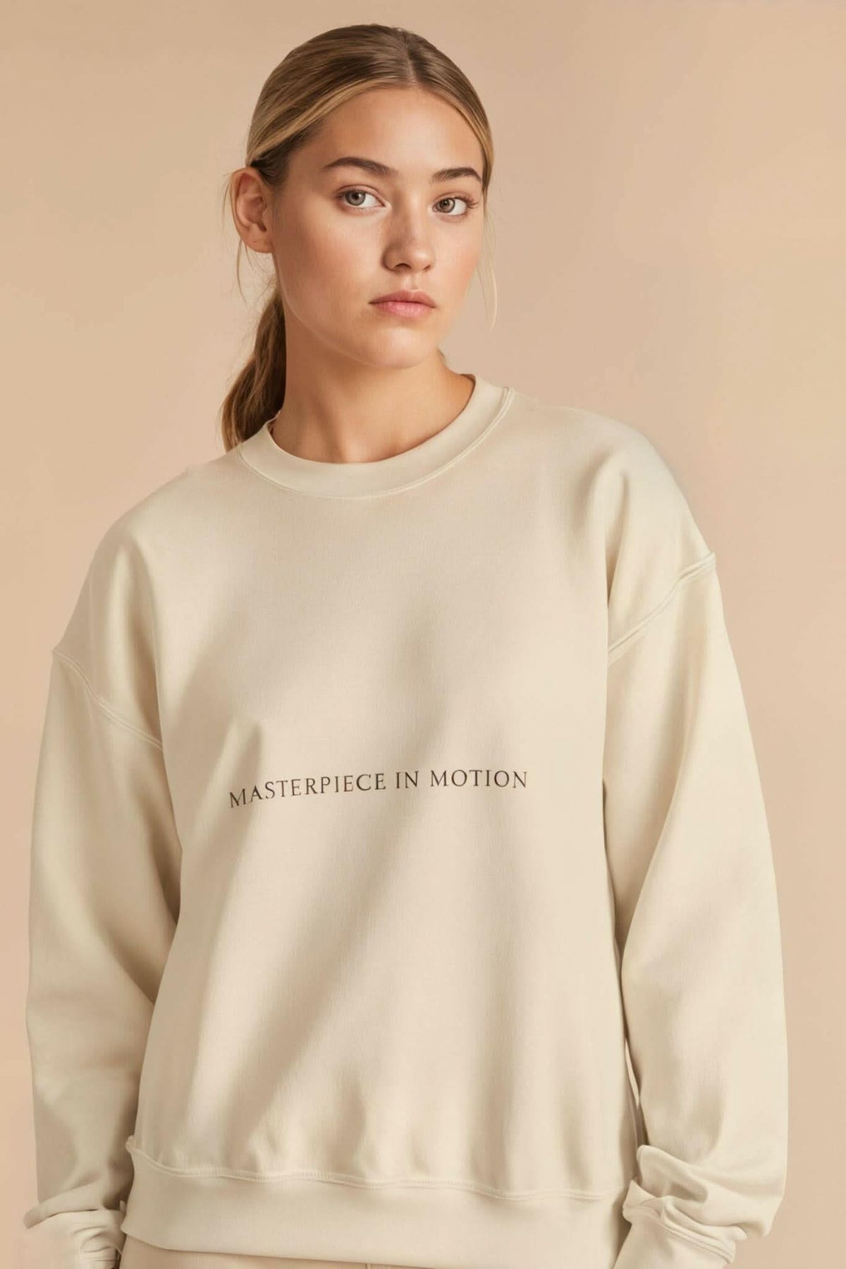 Sand crewneck sweatshirt with 'MASTERPIECE IN MOTION' chest print