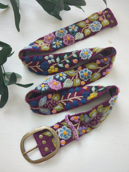 Plum embroidered wide belt with multicolor floral pattern and brass oval buckle