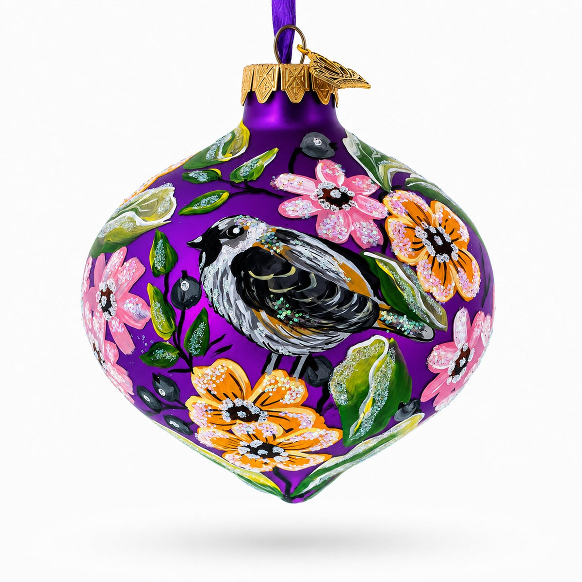 Purple glass onion finial Christmas ornament with bird, flowers, and gold cap