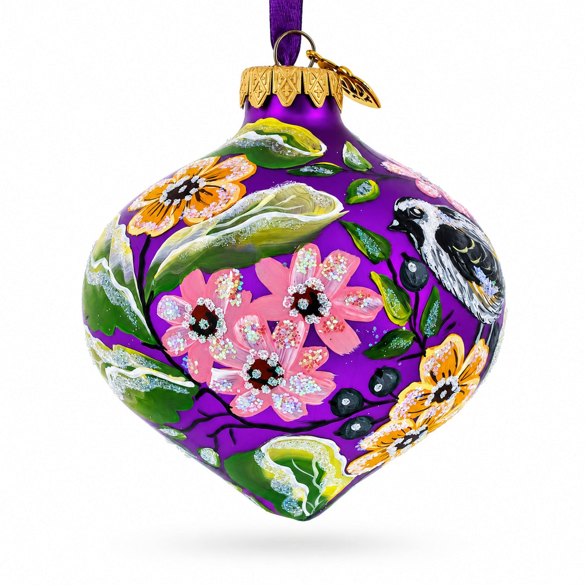 Green and purple glass onion ornament with pink blossoms, orange flowers, and bird