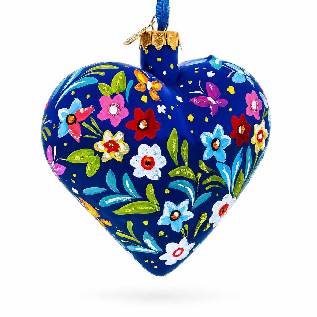 Heart-shaped blue glass ornament with colorful floral pattern and hanging blue ribbon