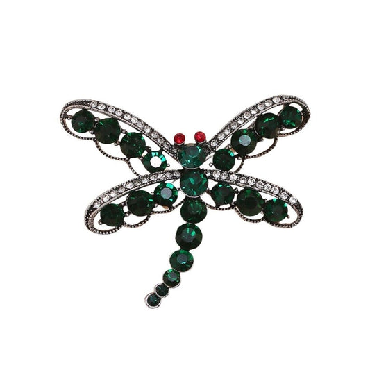 Silver dragonfly brooch with green cubic zirconia and rhinestone accents