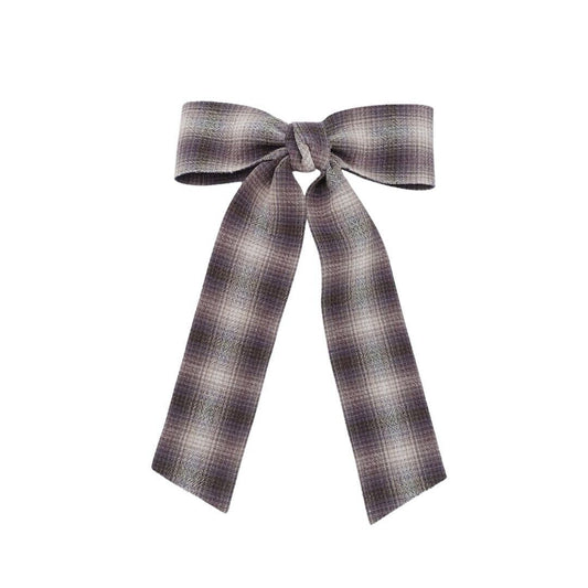 Plaid fabric hair bow barrette in grey with dark trim and long ribbon tails