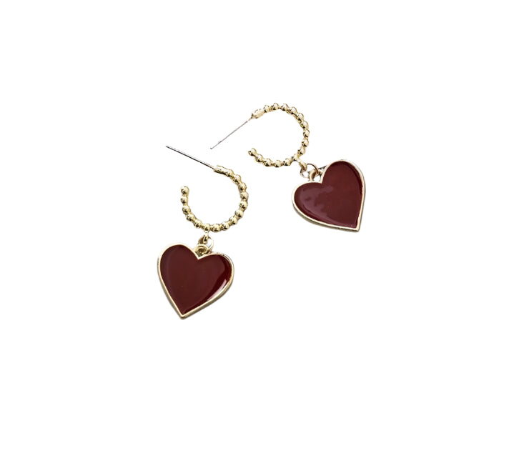 Gold-tone hoop drop earrings with red heart enamel pendants