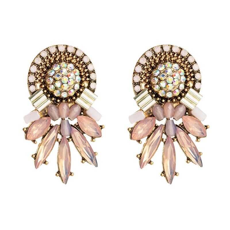 Pink and clear glass stone drop earrings with gold-tone fan fringe, oval center